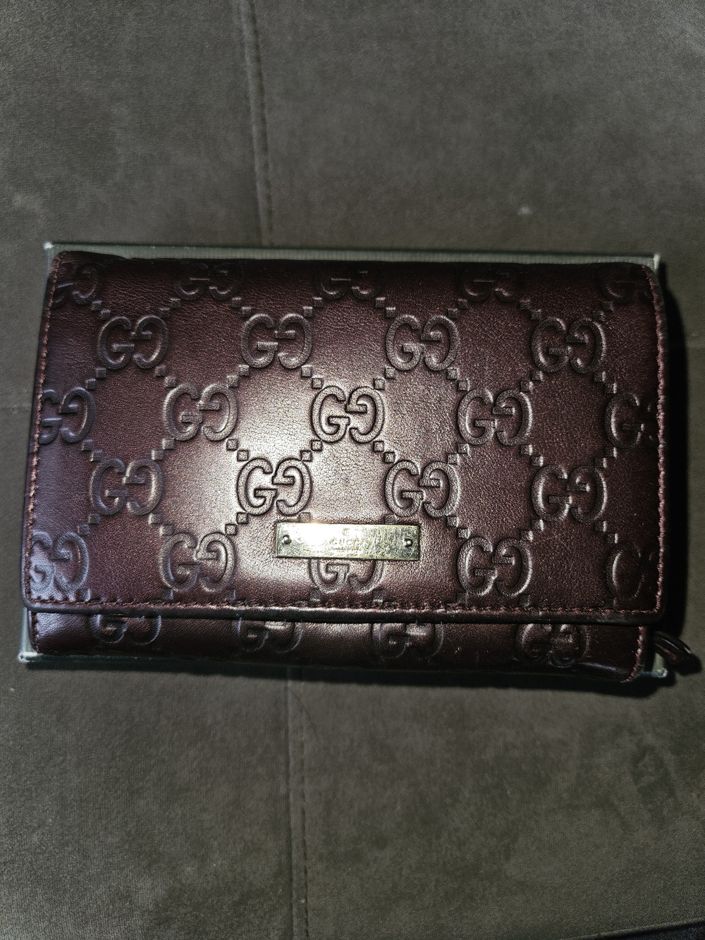 Gucci Embossed GG Leather Wallet